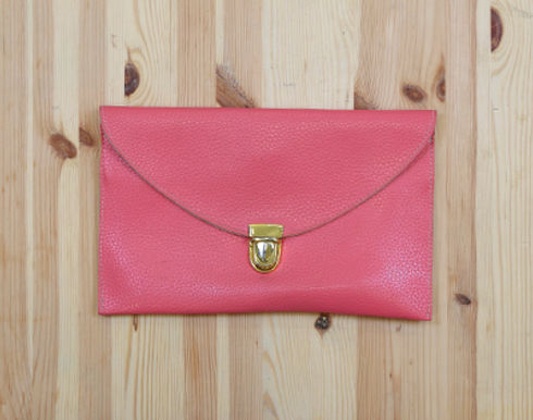 Pink leather envelope clutch