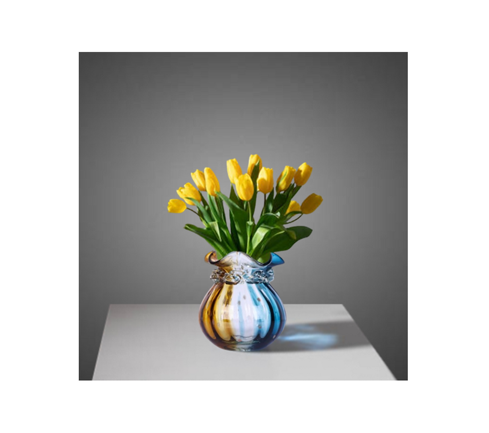 Hand Blown Round Art Glass Vase with Yellow Tulips On Table