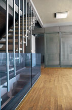 Amaj Darman office project by KRDS – Kourosh Rafiey Design Studio (کوروش رفیعی، معمار ایرانی); elevated glass-and-metal workp