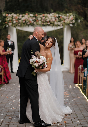 bride and groom kissing at The Mackey House in Savannah