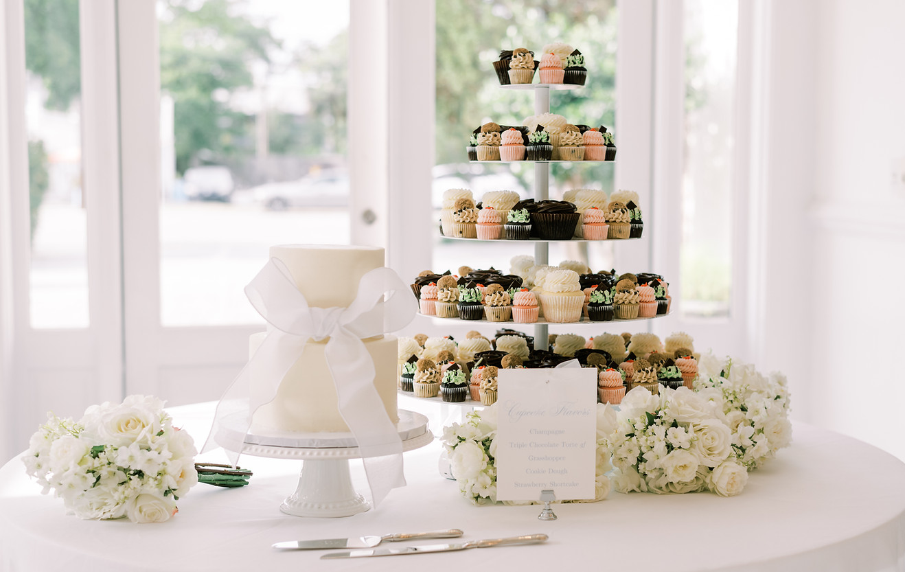 wedding cake and cupcake tower
