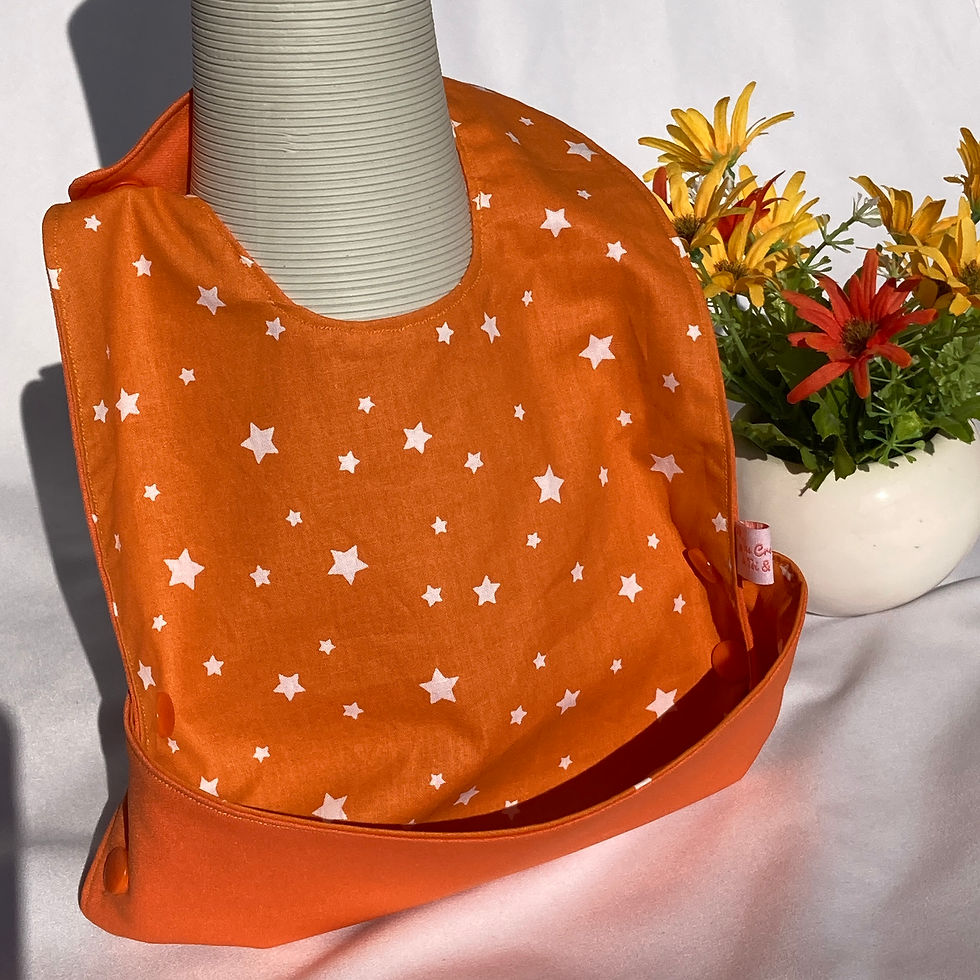 Miniature : Bavoir imperméable récupérateur réversible - ORANGE ETOILES