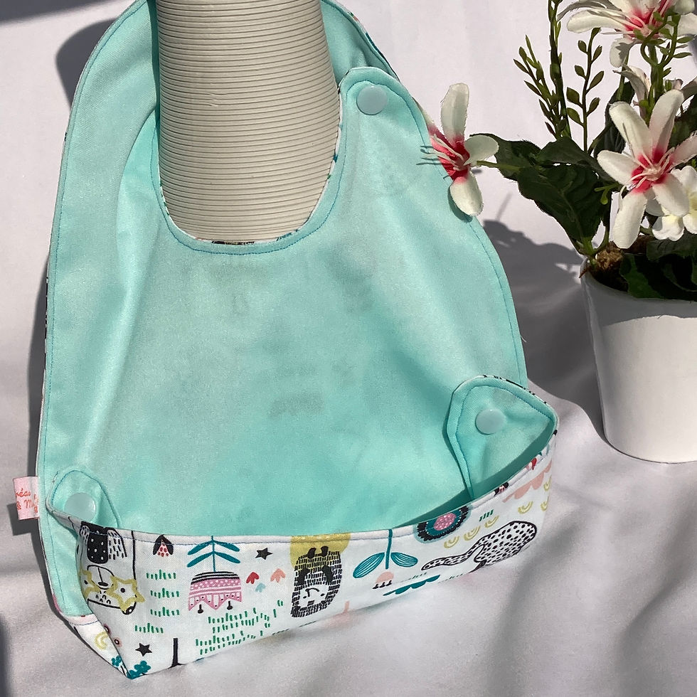 Miniature : Bavoir imperméable avec réservoir amovible réversible - BLEU TURQUOISE ANIMAUX