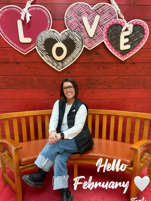 Sitting on a bench with LOVE sign