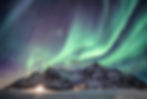 Northern Lights Finland snowy mountains luxury travel