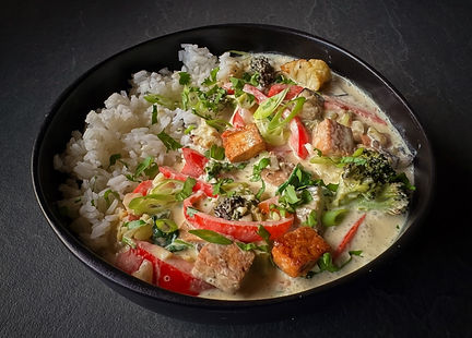 Green Thai vegetable curry with butternut squash, mushrooms, broccoli, and peppers