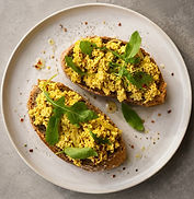 Creamy vegan tofu egg salad with green onions and black pepper