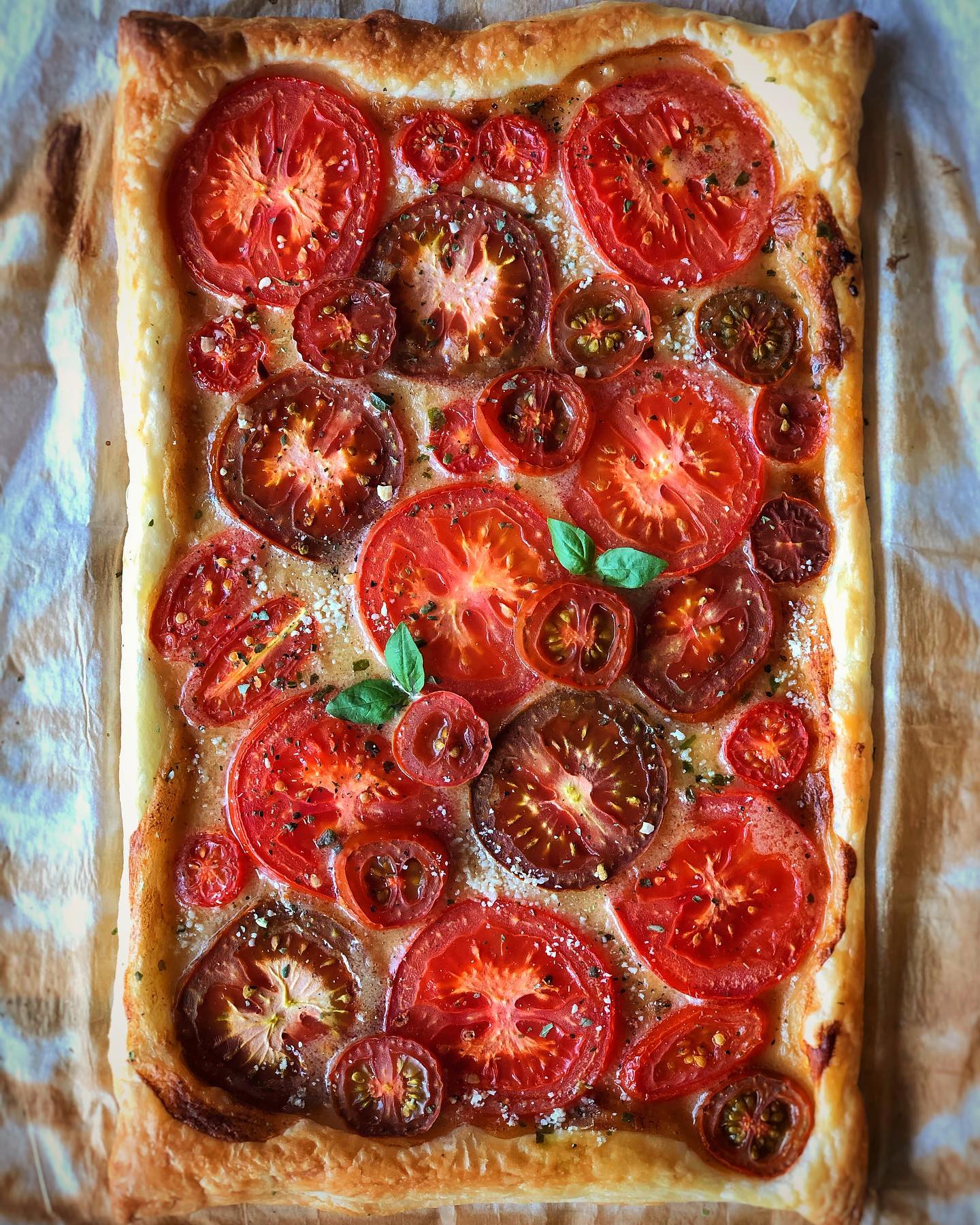 Vegan tomato tart with tofu ricotta, heirloom tomatoes, basil, and puff pastry