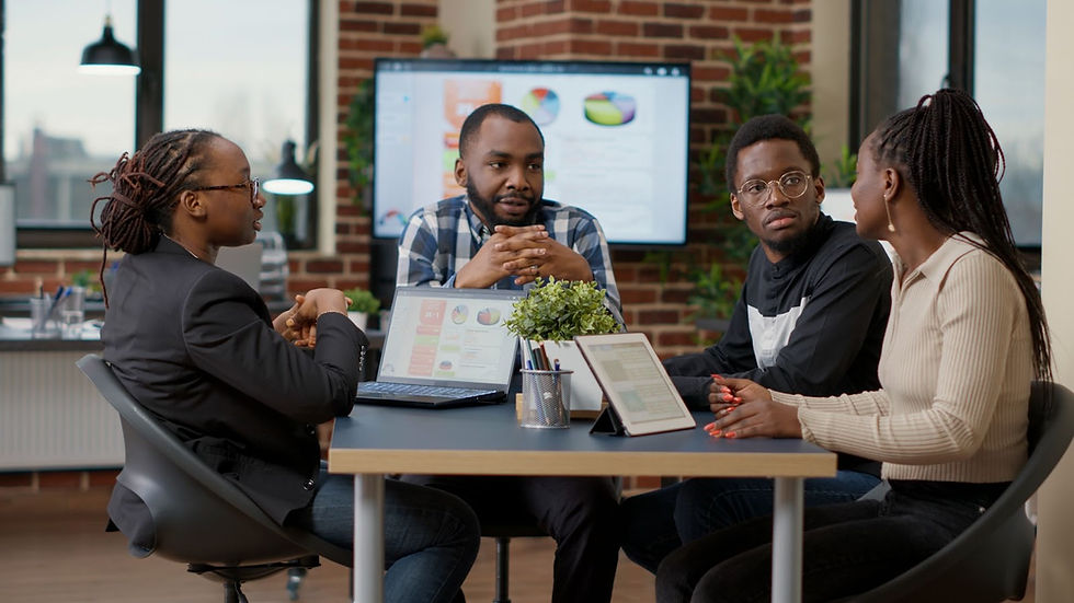 Business team reviewing compliance requirements and regulatory documents in an office setting