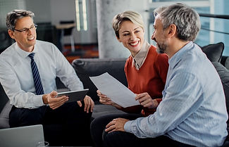 happy-couple-talking-while-having-consultations-with-their-agent-office_637285-11098.jpg