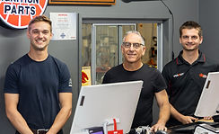 Toby Dan and Joe behind the counter.jpeg