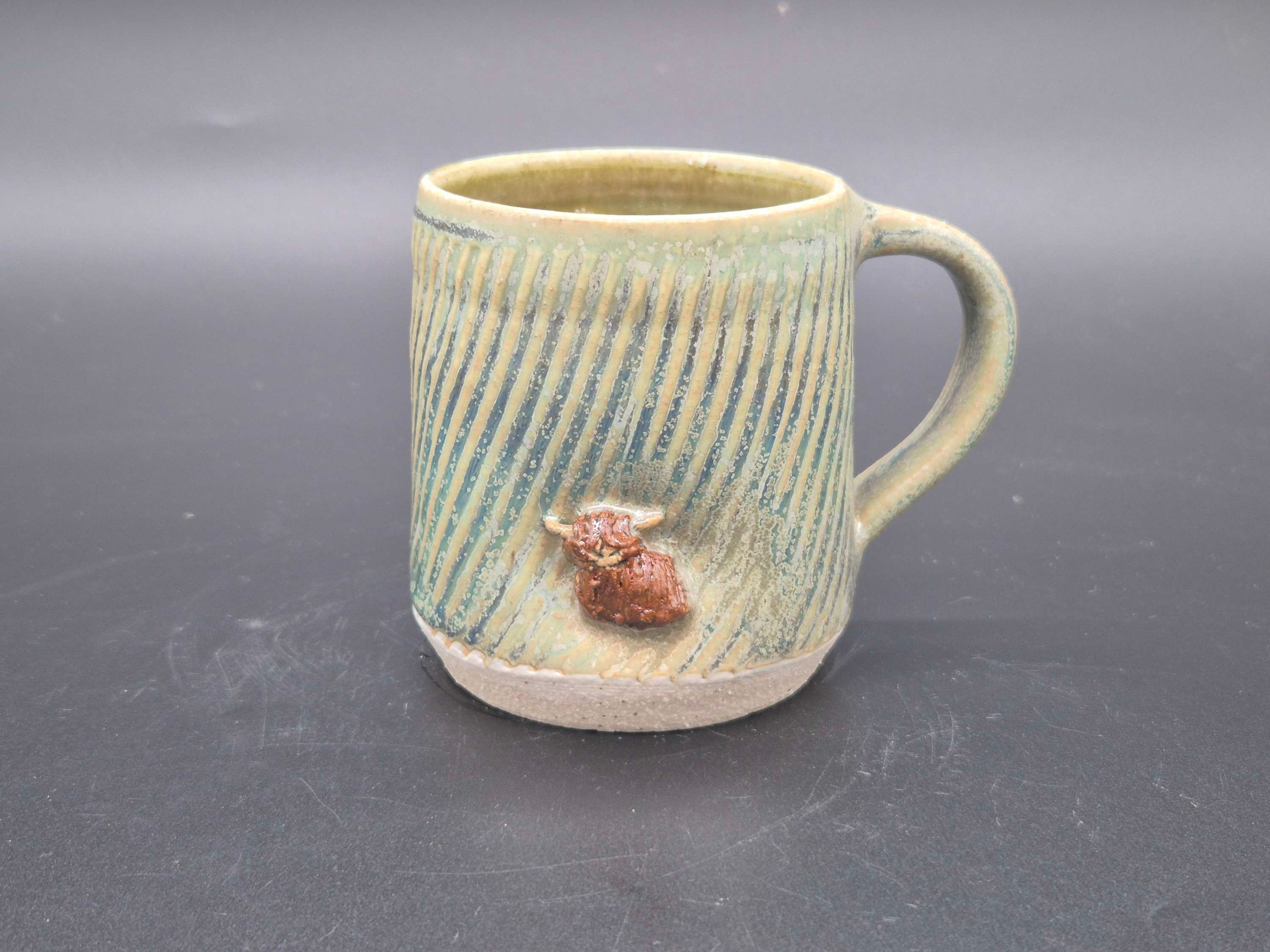 Highland Cow small mug in textured green