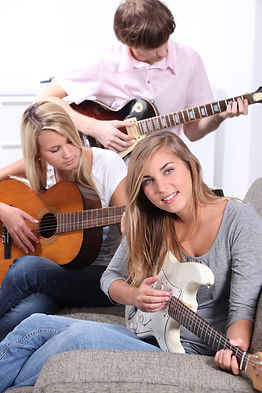 Young people playing guitars_edited.jpg