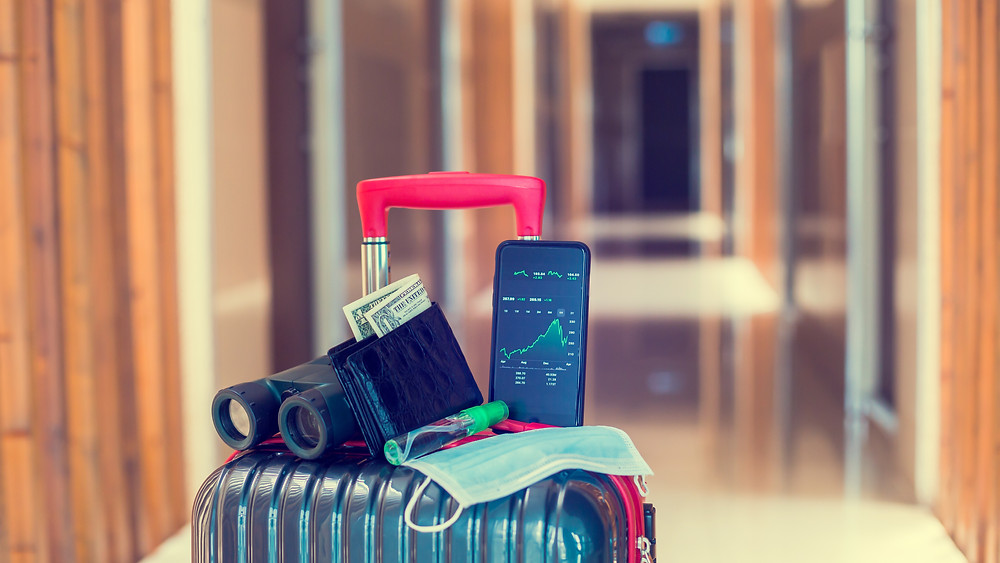 going holidays during pandemia - phone, mask, money, luggage