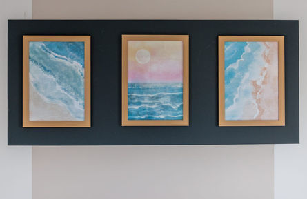 Three framed abstract ocean art
