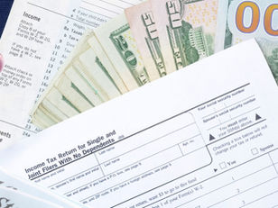 A collage of income tax return, money, and 401 K savings