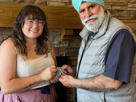 Presentation of a new CPCA Challenge Coin to Indigenous Artist Joan Williams