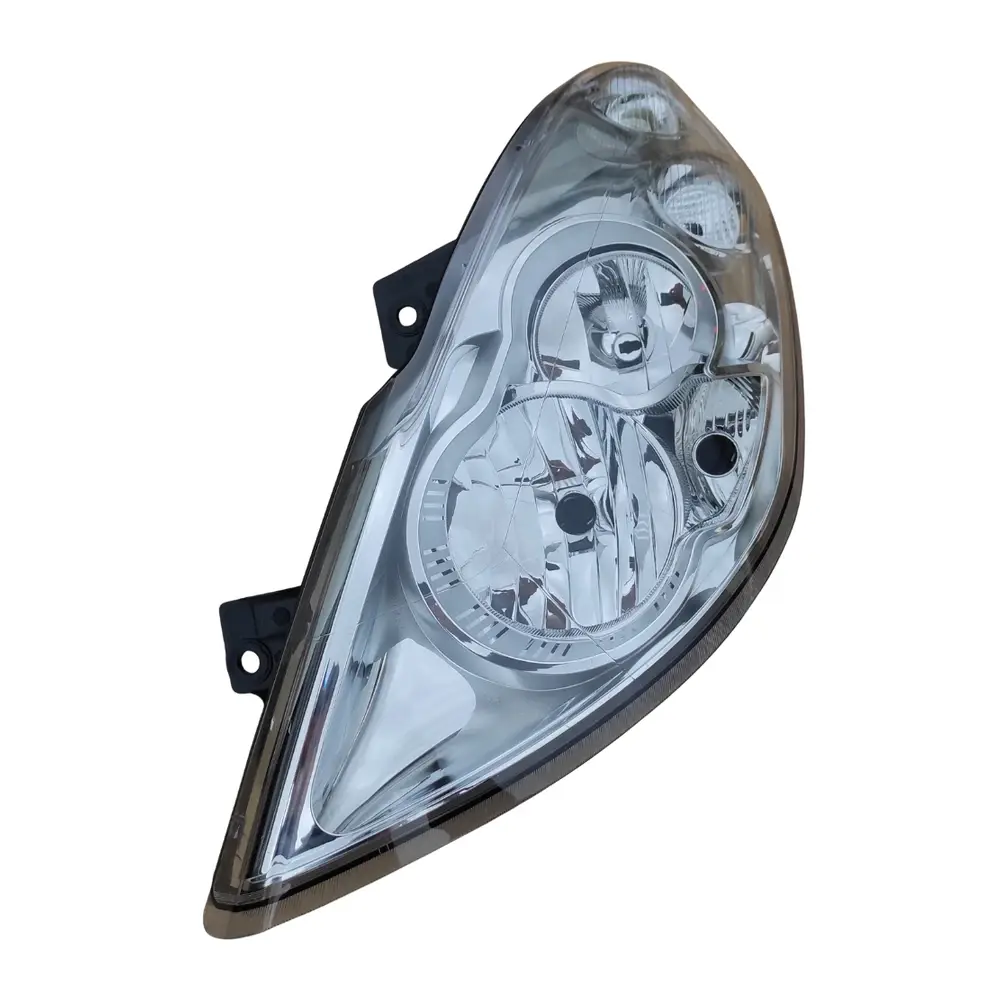 Phare avant gauche TYC 20-12338-25-2 Renault Master Opel Movano sur fond blanc