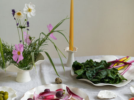 a tablescape with Joanna Ling Ceramics on brand page on The Wedding Present Company website