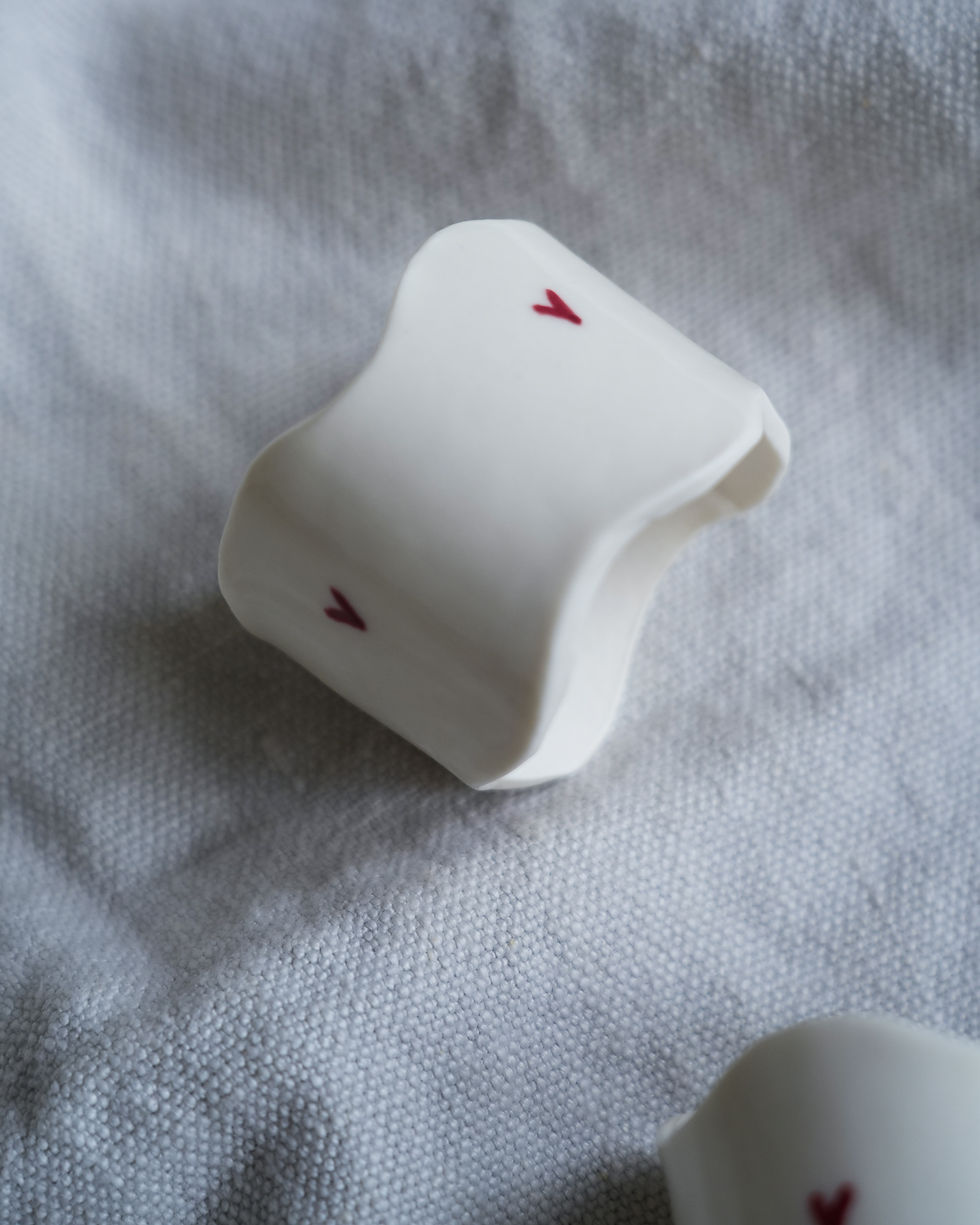 porcelain napkin rings with  red heart decoration
