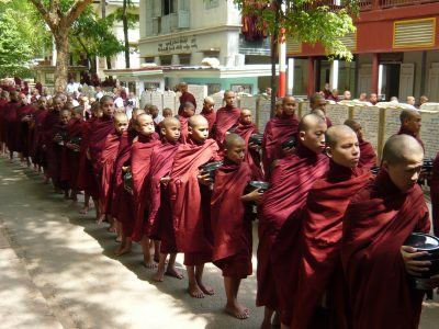 Monks in line for lunch at Mahagandayon Monastery