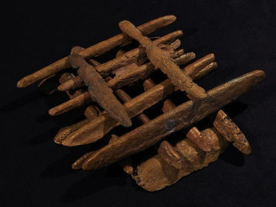 Photo showing mysterious metal ingots discovered in a 2,600 year old shipwreck off the coast of Sicily. Some believe this to be Plato's orichalcum. 