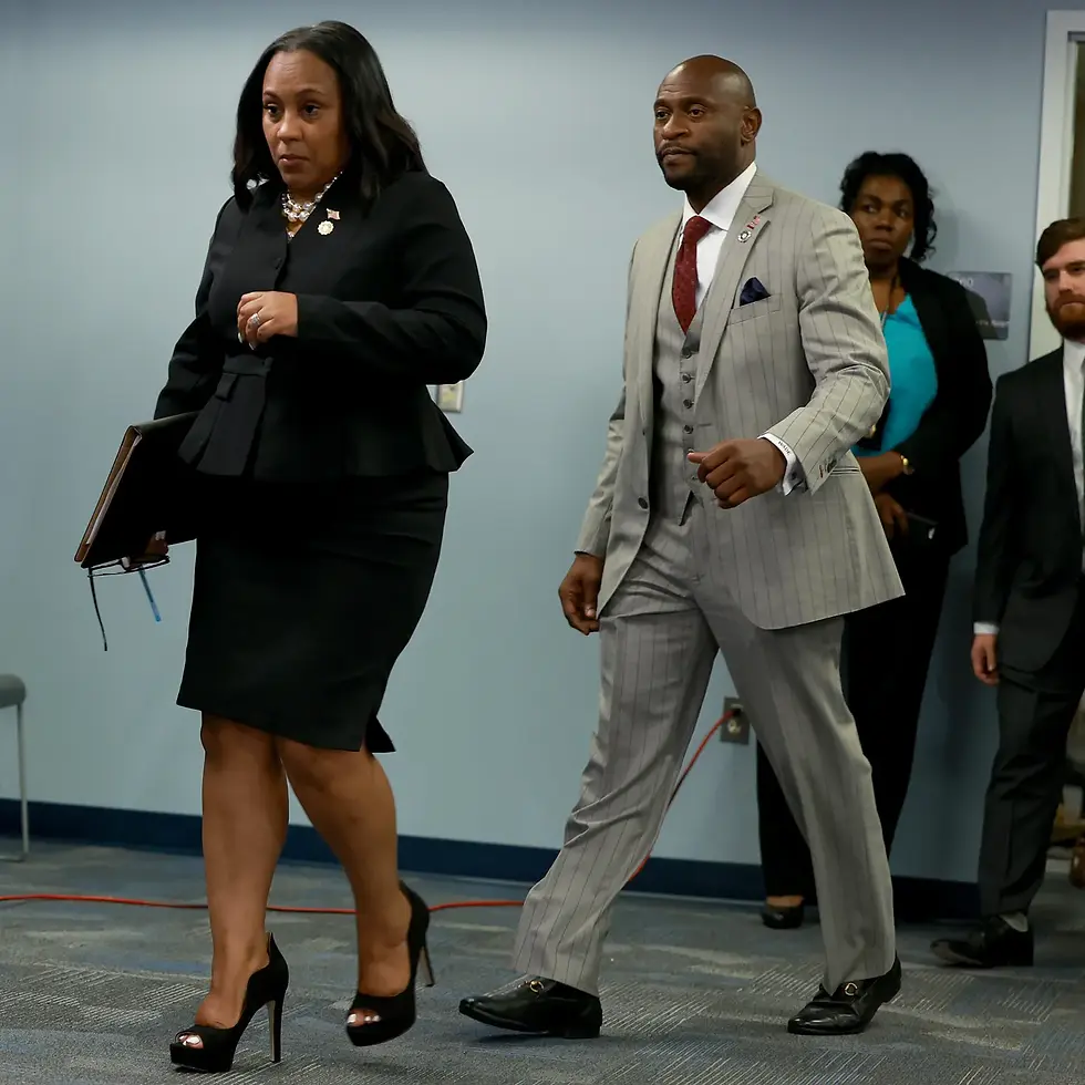 Fulton County District Attorney Fani Willis arrives at a press conference with prosecutor Nathan Wade after a Grand Jury brought back indictments against former president Donald Trump and his allies in their attempt to overturn the state's 2020 election results, in Atlanta, Georgia, U.S. August 14, 2023. REUTERS/Nouvelage.