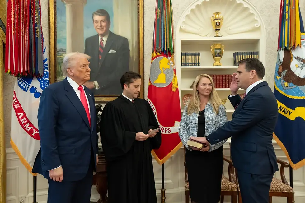 President Donald Trump stands with Todd Blanche during Blanche’s swearing-in ceremony in the Oval Office in March 2025.