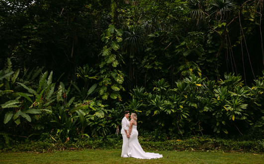 Bridal portraits with a lush, jungle backdrop on the north shore of Kauai at Hideaways Beach