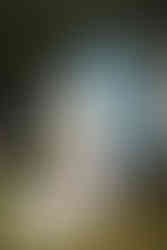 Couple laughing as a rooster steals their shave ice at Wishing Well, Slow Yourself Down in Hanalei