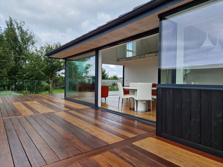Inside/outside living with minimal enclosure: house near Tenby, Pembrokeshire, Wales.