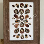Plumes de Kâ, décor floral avec des plumes.