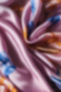 Close-up image of a women's silk scarf.jpg