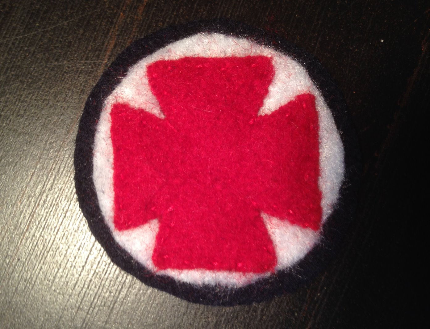 "Consolidated" Corps Badges