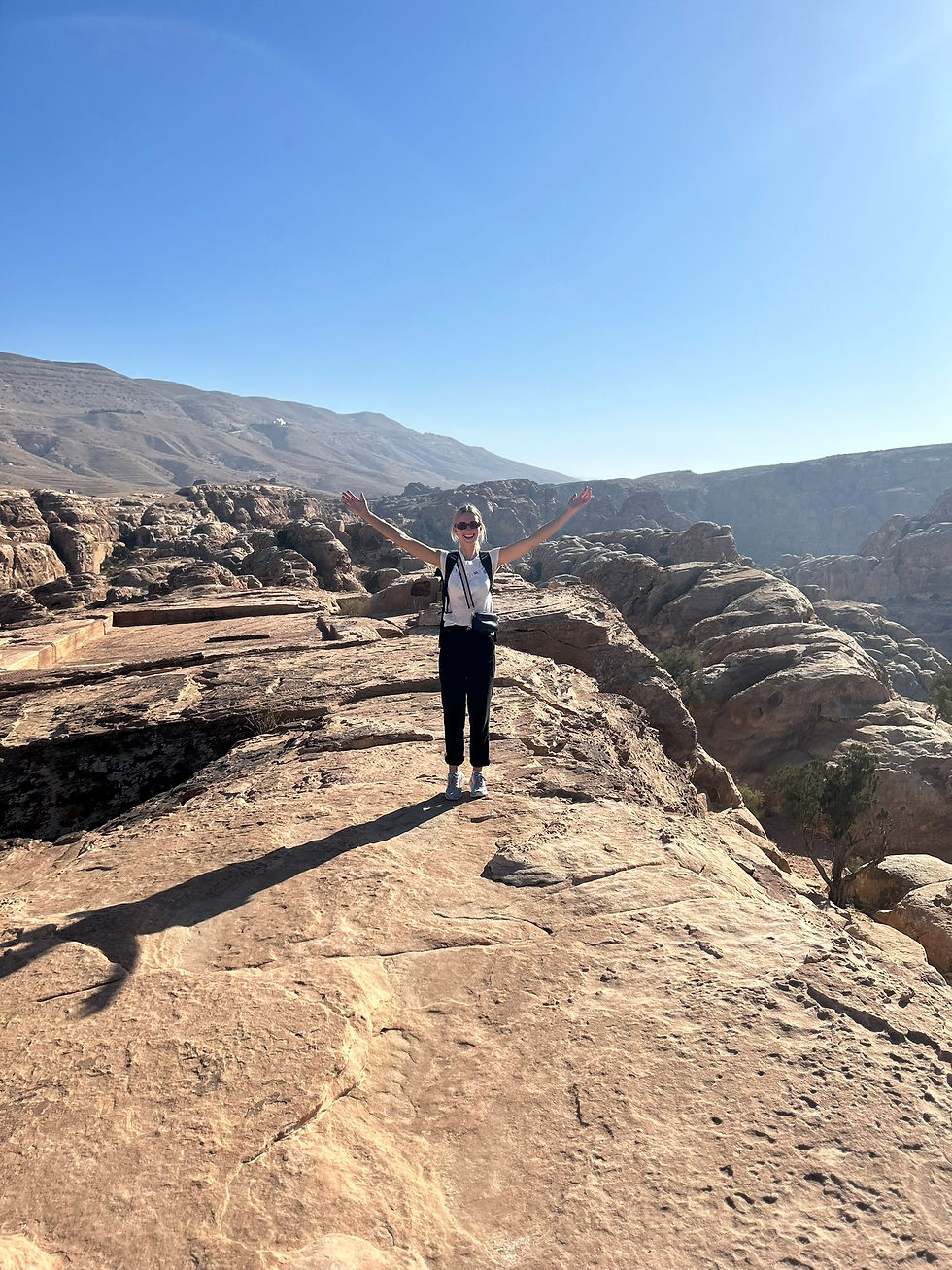 girl standing on top of hill in Jordan Petra