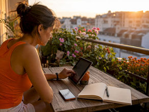 Woman comparing fasting apps at home table