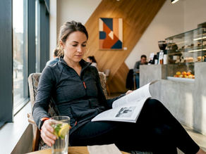 Woman reading article on fasting and sleep quality