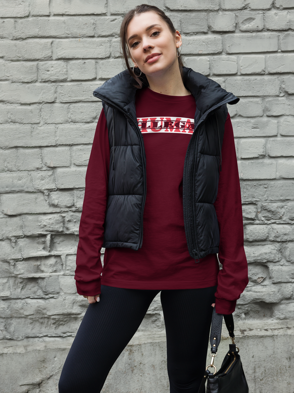 Woman modeling maroon long-sleeve shirt with "WINNER" graphic