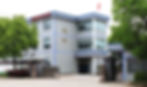 A front view of the motor lamination factory Yuyao Yuanzhong Motor Punching Co., Ltd. located in Ningbo, China