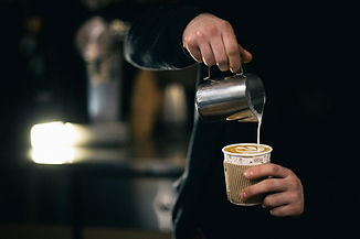 Barista Pouring Milk