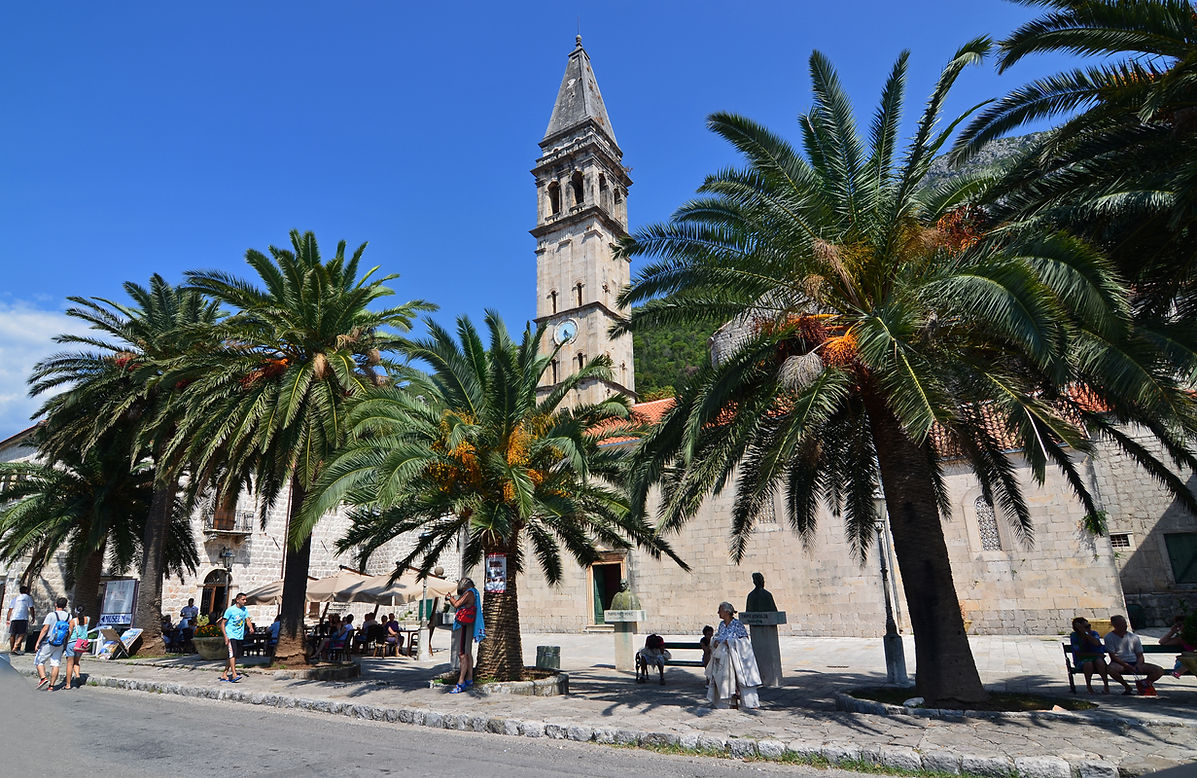 Perast Montenegro waterfront with historic buildings and Bay of Kotor view