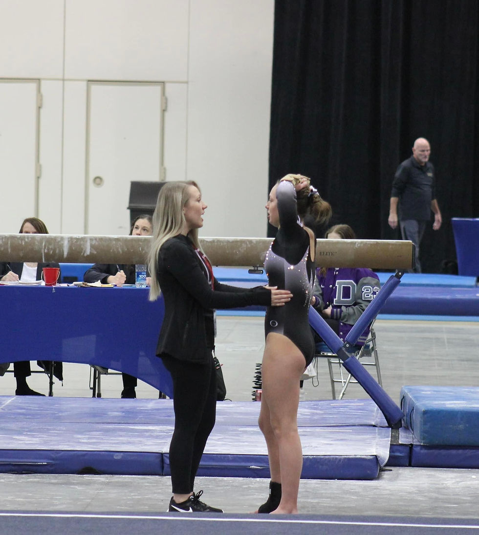 Coach Marie reassures and boosts the confidence of her student before a competition, creating a calming and inspiring presence.