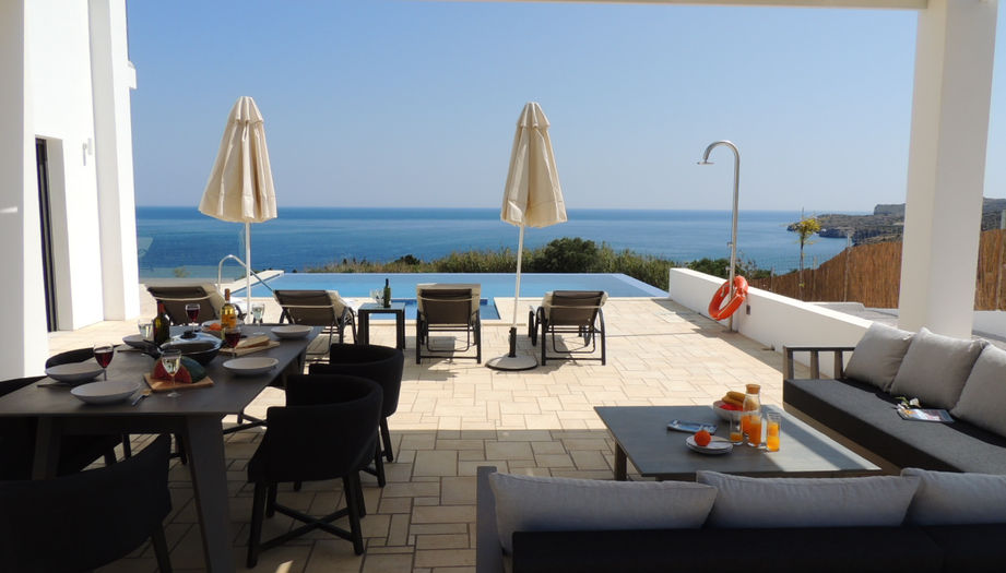 11 Zeus Bay shaded pool side lounging and dining area.JPG