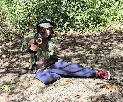 boy with blaster on the ground (2).jpg