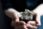 model-house-woman-s-hand-boxes-background_edited.jpg