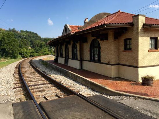 A train station with train racks, turned into a museum site.
