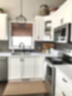 Modern Farmhouse Kitchen Makeover | Repainted Cabinets and Unique Backsplash