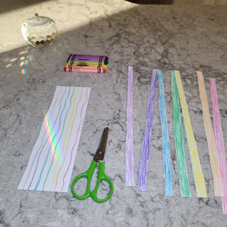 Cutting out rainbows from paper on a stick. Big Box Noah's Ark project. Bible activities for kids