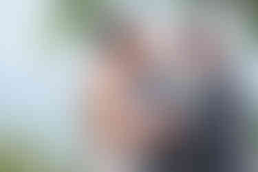 a bride and groom exchange rings during their wedding ceremony