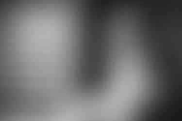 a black and white photo of a bride and groom